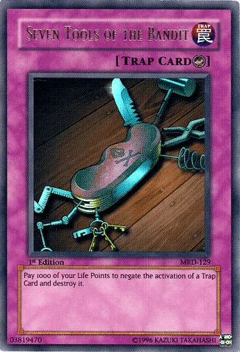 1st Edition, Counter Trap, Metal Raiders, Trap, Ultra Rare, Unlimited Seven Tools of the Bandit [MRD-129] Ultra Rare - Trading Card World